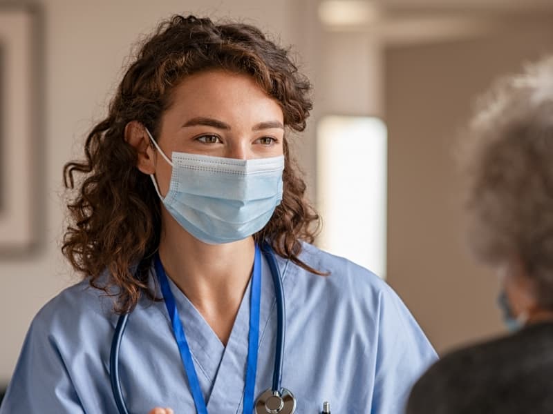 Image of Person Taking Care of a Patient